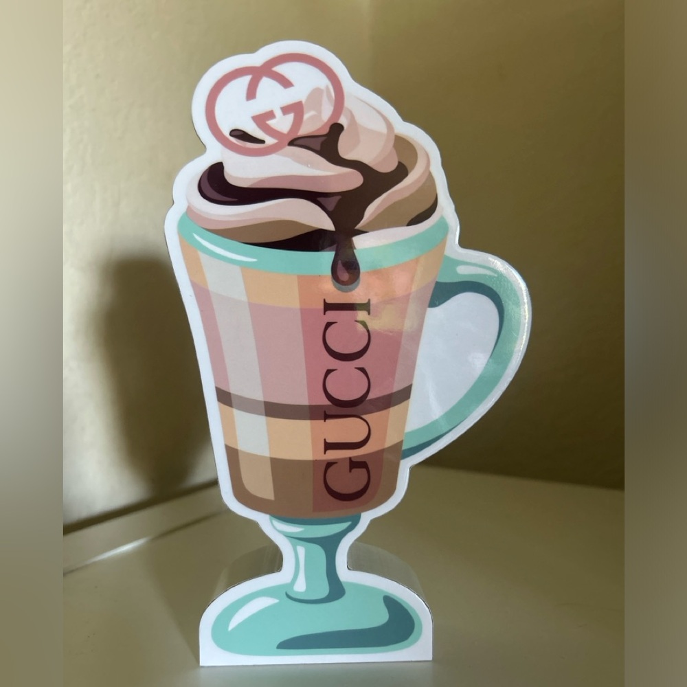 Brand new wooden Gucci decor.